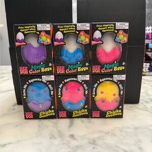 Nee Doh Magic Color Eggs Kids Squeeze Toy - Pink, Blue, Purple, Yellow